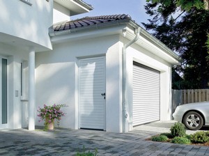 Portillon indépendant pour porte enroulable